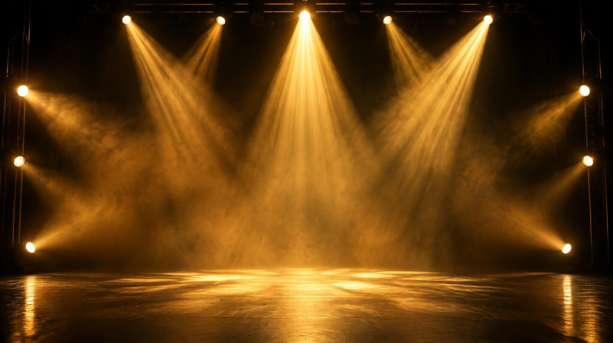 Stage with warm spotlights and beams of light